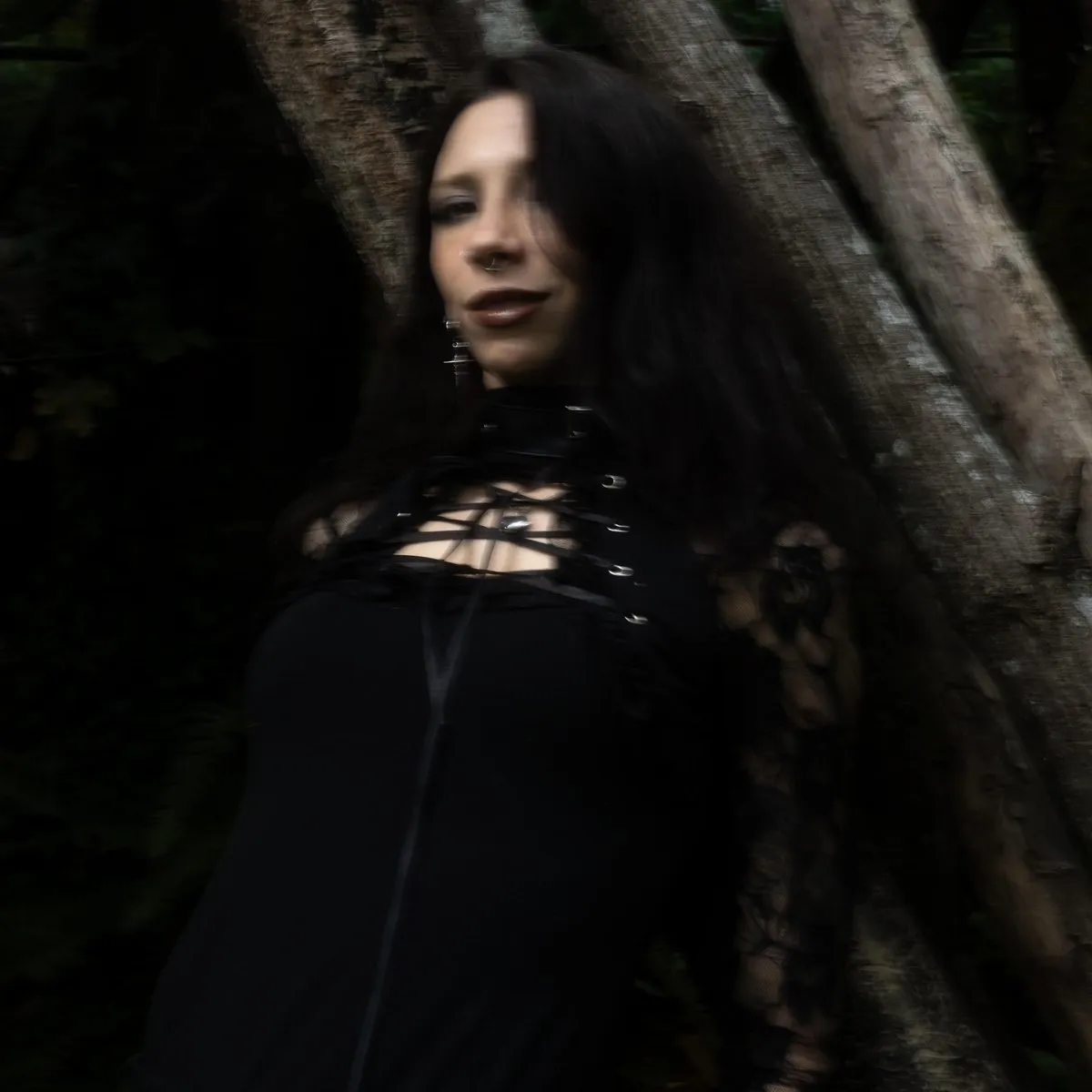 Natasha Ros in woodland, photographed in motion